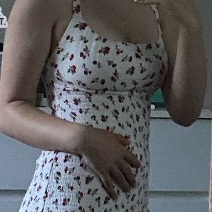 skintight white dress with little cherries